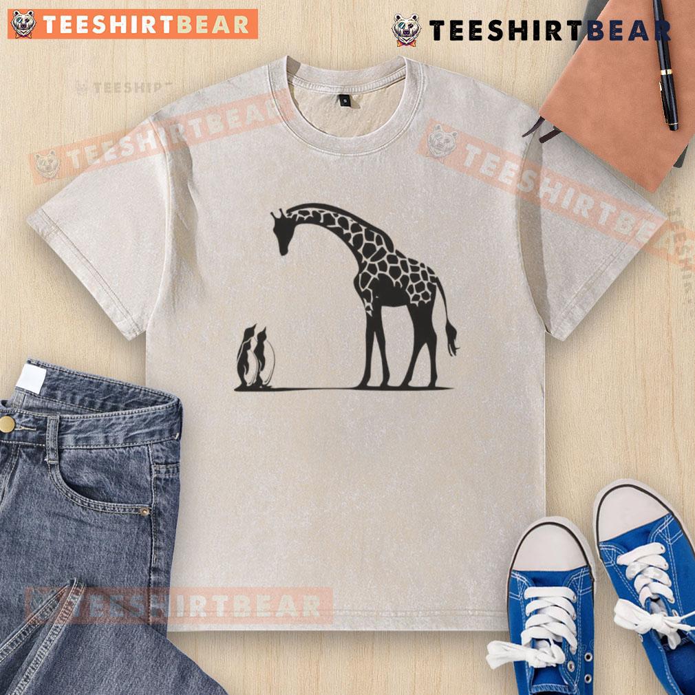 Alt Text: Happy penguin and giraffe on a tall and small washed t-shirt, perfect for kids' playful fashion.