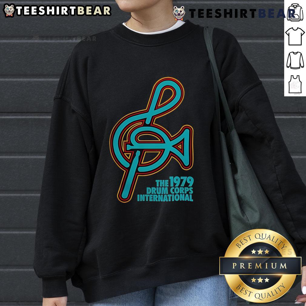 Alt Text: Happy The 1979 Drum Corps International New Sweatshirt featuring vibrant colors and a stylish design for fans.
