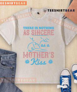 Happy 'There Is Nothing As Sincere As A Mother's Kiss' washed t-shirt displayed on a wooden background.