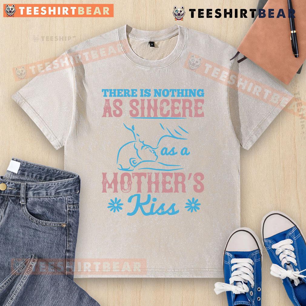 Happy 'There Is Nothing As Sincere As A Mother's Kiss' washed t-shirt displayed on a wooden background.