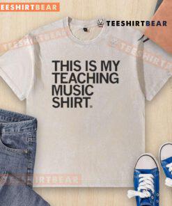 Alt Text: Happy teacher wearing a 'This Is My Teaching Music' washed t-shirt, showcasing passion for music education.