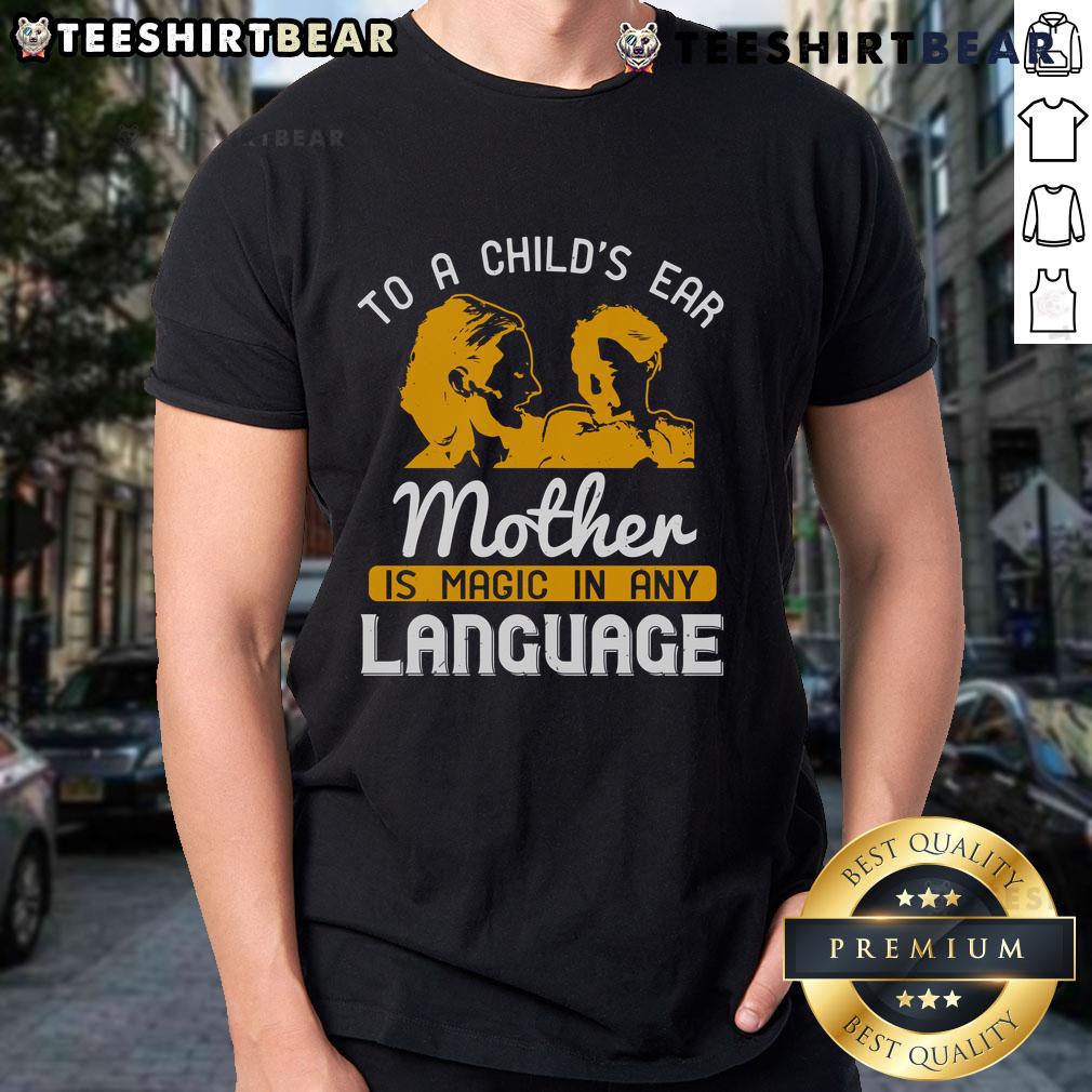 Happy child wearing 'Mother Is Magic In Any Language' T-shirt, showcasing love and joy in a colorful design.