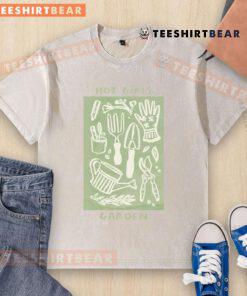 Hot girls in a garden wearing a cottagecore washed t-shirt, showcasing a love for gardening and plant aesthetics.