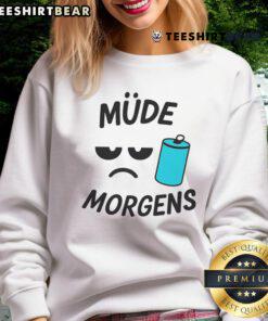 Cozy Nice Mude Morgens sweatshirt displayed on a wooden background, perfect for casual wear and chilly mornings.
