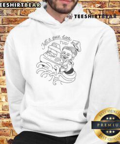 Alt Text: Cozy hoodie featuring the 'Just A Quick Little Tugski' logo, set against a backdrop of a nice rusty van at a ranch.