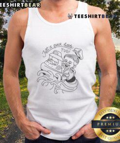 Nice rusty van at a ranch with a Tugski logo tank top, showcasing rustic vibes and outdoor adventure style.