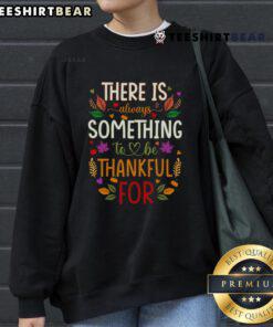 Alt Text: Cozy 'Nice Thanksgiving' sweatshirt with the phrase There is always something to be thankful for in festive colors.