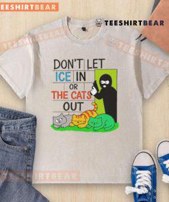 Alt Text: Official Don't Let ICE In or the Cats Out washed t-shirt featuring a bold graphic design, perfect for cat lovers.