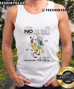 Alt Text: Casual style with Wituka tank top featuring 'I Am In No Rush' slogan, perfect for enjoying leisurely walks.