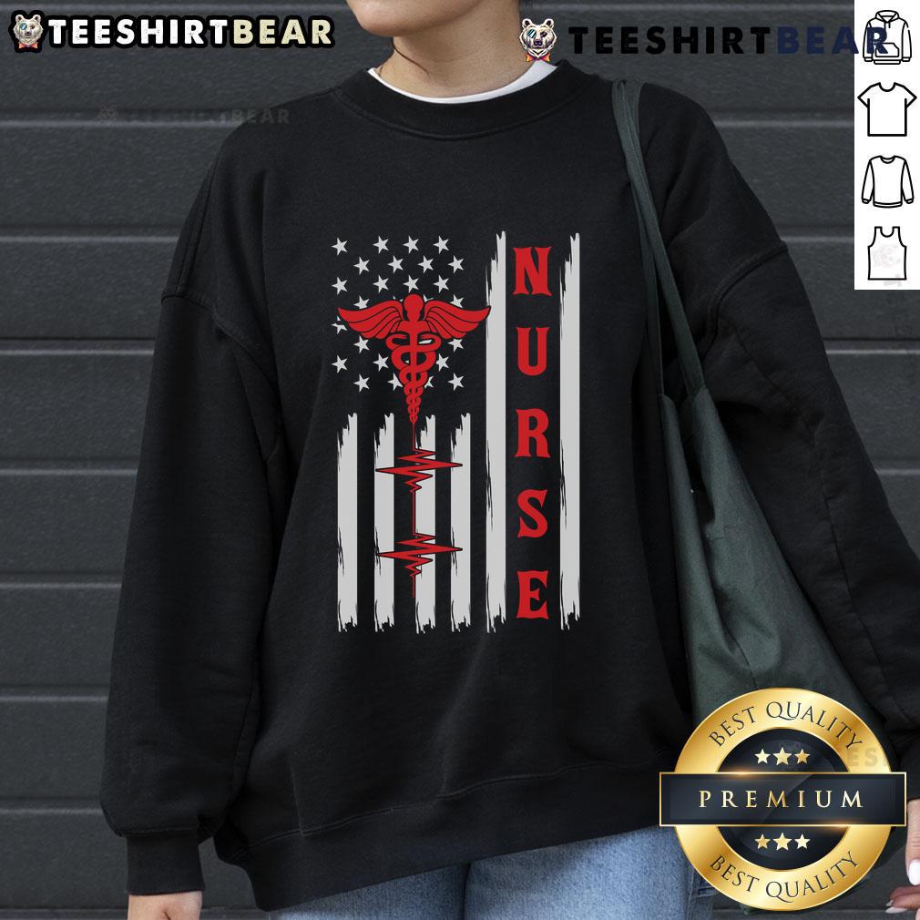Alt Text: Official Red Nurse Caduceus sweatshirt featuring American flag and ECG heartbeat design, perfect for healthcare professionals.