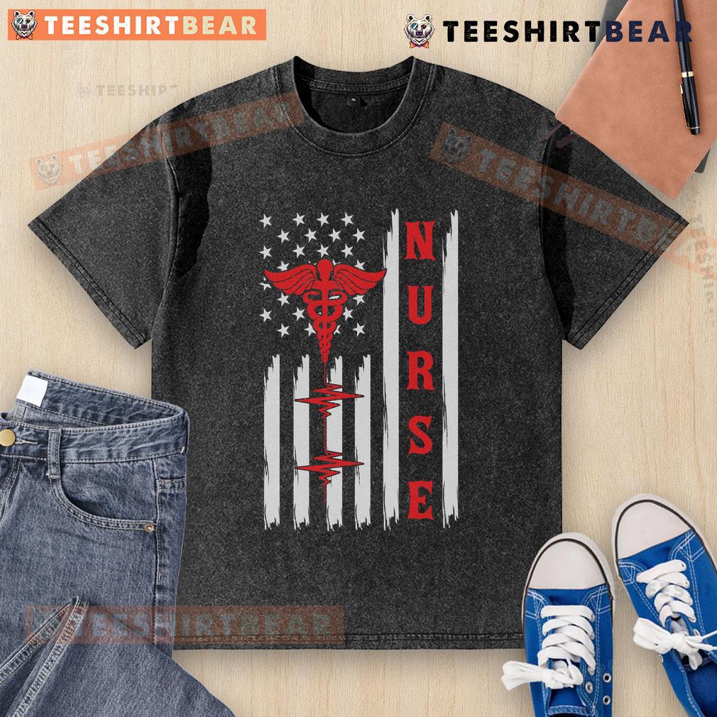 Red nurse caduceus graphic on American flag with ECG heartbeat design on washed t-shirt for healthcare professionals.