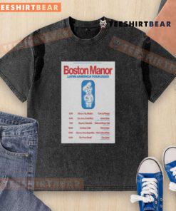Alt Text: Official Tour Latin America 2025 Boston Manor poster design on a washed t-shirt showcasing vibrant graphics and tour details.