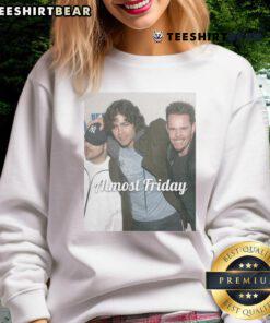 Alt Text: Official Young Entourage Almost Friday Sweatshirt in cozy fabric, perfect for casual outings and relaxed weekends.
