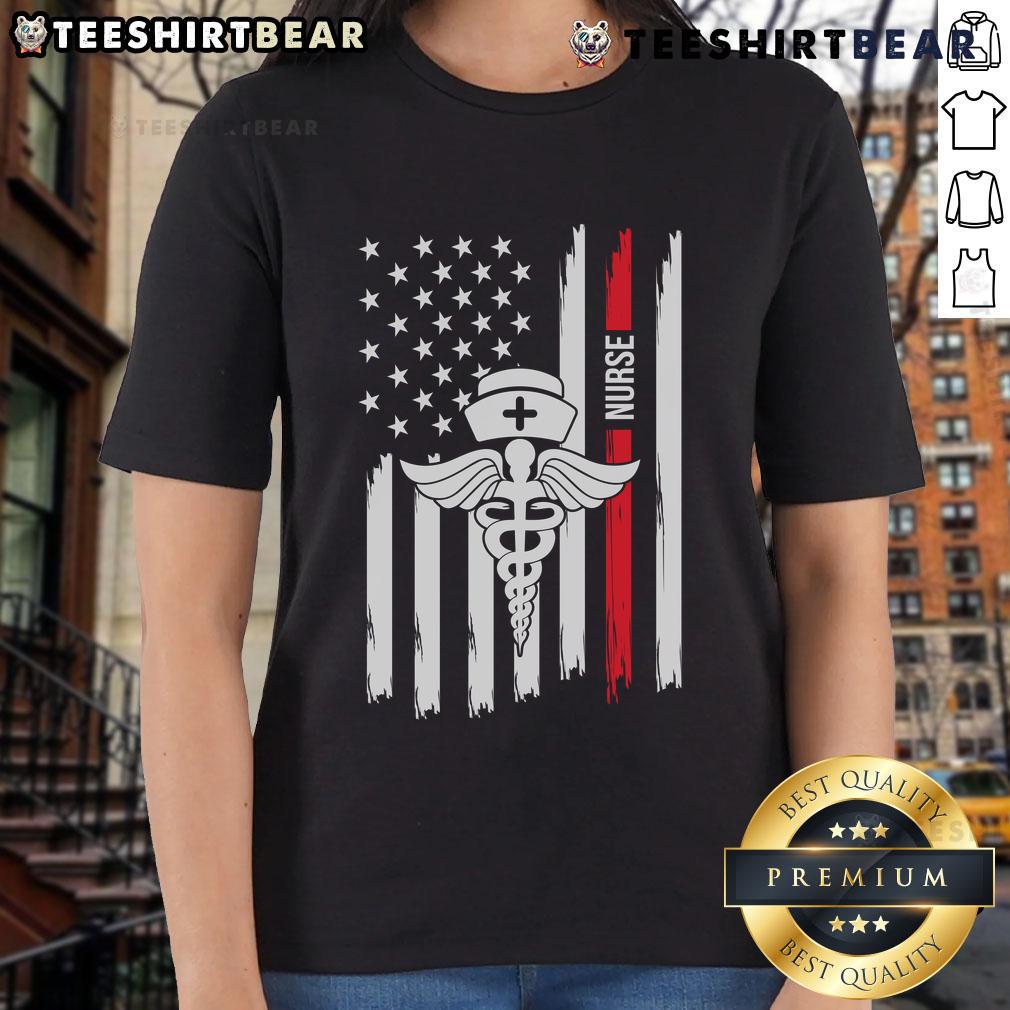 Alt Text: Premium American Flag Nurse Tee with Caduceus and Red Stripe, honoring healthcare heroes in stylish ladies' fashion.