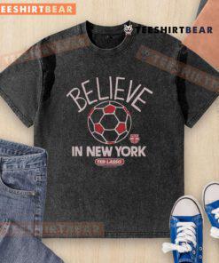 Alt Text: Premium New York Red Bulls Homage MLS x Ted Lasso Believe washed t-shirt featuring vibrant graphics and a comfortable fit.
