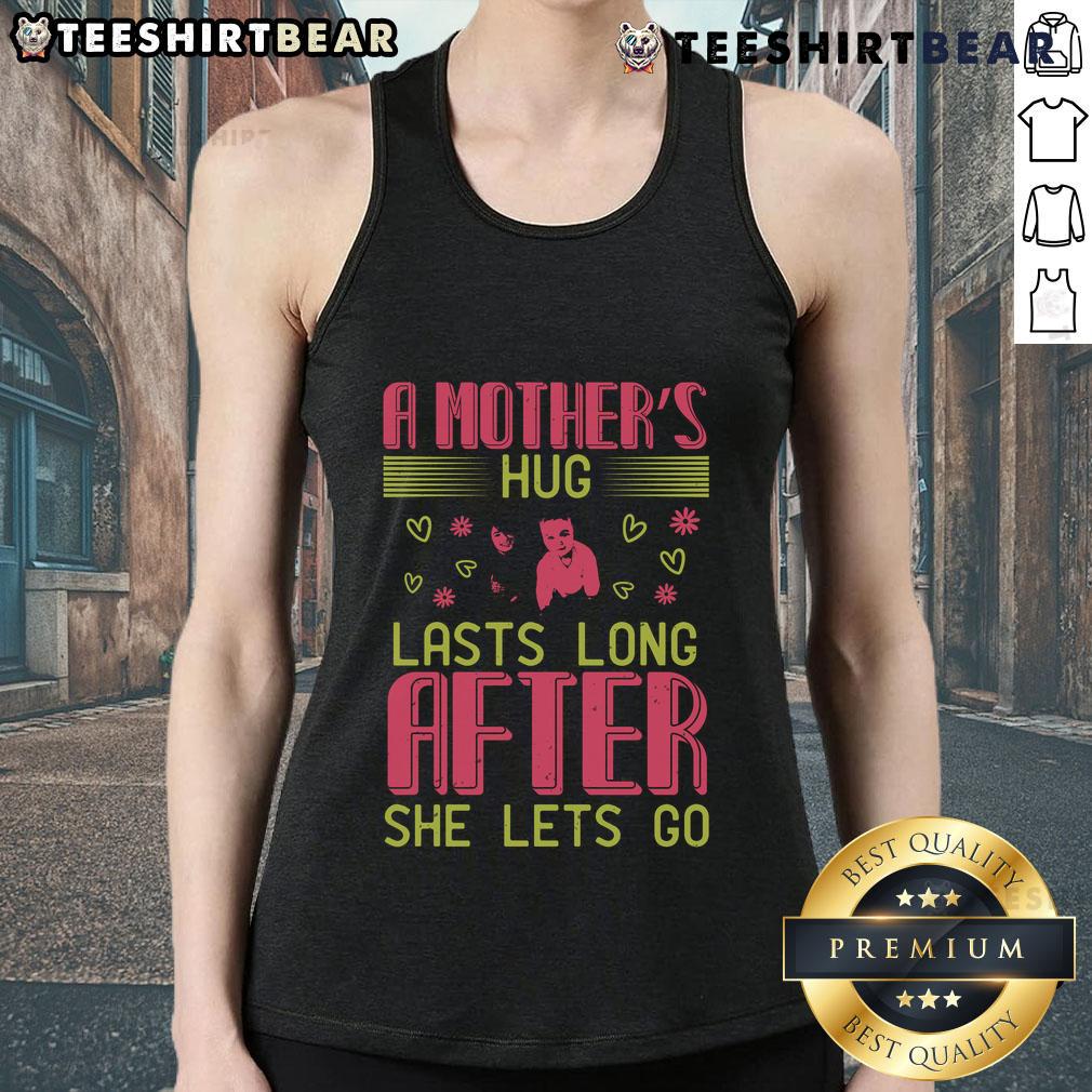 Girl in a tank top enjoying a warm hug, showcasing the sentiment that a mother's hug lasts long after she lets go.