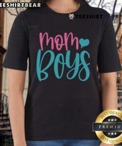 Pretty mom wearing a stylish tee with her two boys, showcasing family bonding and trendy fashion in casual attire.
