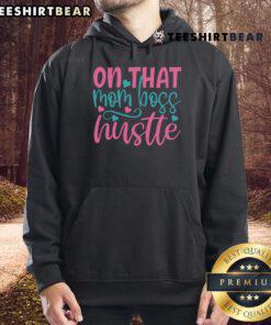 Alt Text: Stylish 'Pretty On That Mom Boss Hustle' hoodie in a cozy setting, perfect for empowering moms on the go.