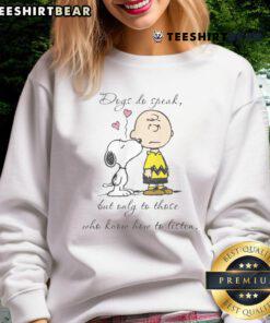 Alt Text: Pretty Snoopy Peanuts sweatshirt featuring dogs with the quote: 'Dogs do speak but only to those who know how to listen.'