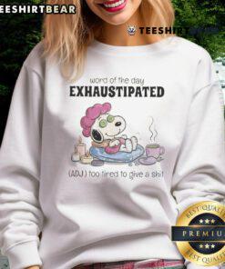 Cozy sweatshirt featuring Snoopy and the word of the day 'Exhaustipated' - perfect for those too tired to care.
