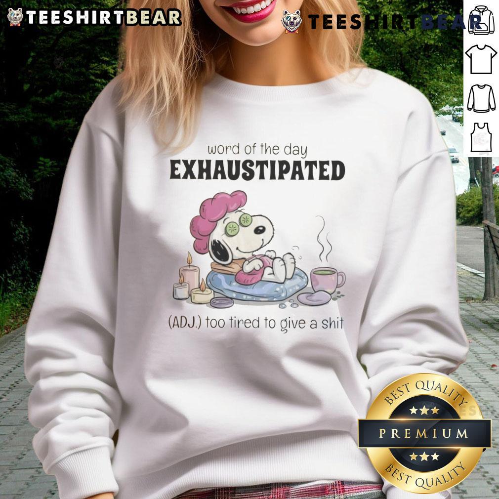 Cozy sweatshirt featuring Snoopy and the word of the day 'Exhaustipated' - perfect for those too tired to care.