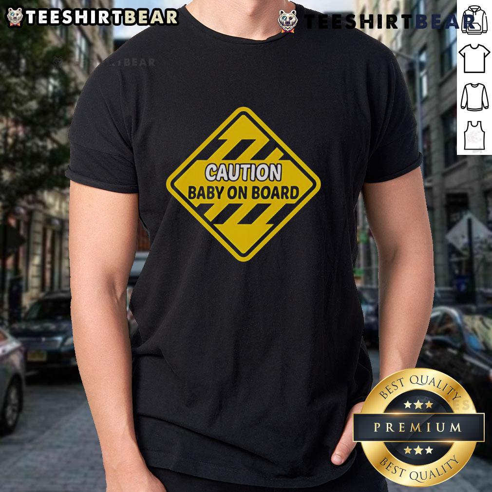 Top Caution Baby On Board T-Shirt featuring a playful design, perfect for expecting parents and family outings.