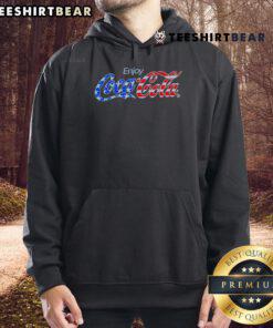 Top Enjoy Coca-Cola hoodie displayed on a mannequin, showcasing vibrant red color and iconic logo for casual wear.