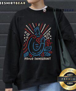 Proud immigrant sweatshirt featuring 'Top Here to Make a Difference' design, showcasing immigrant pride and empowerment.
