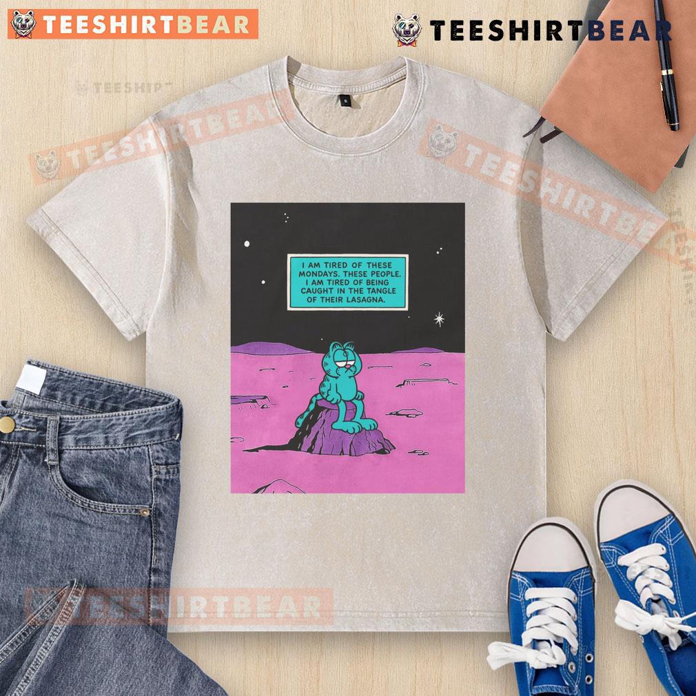 Casual washed t-shirt with 'I Am Tired of These Mondays' design, perfect for relaxed weekend wear and expressing Monday blues.