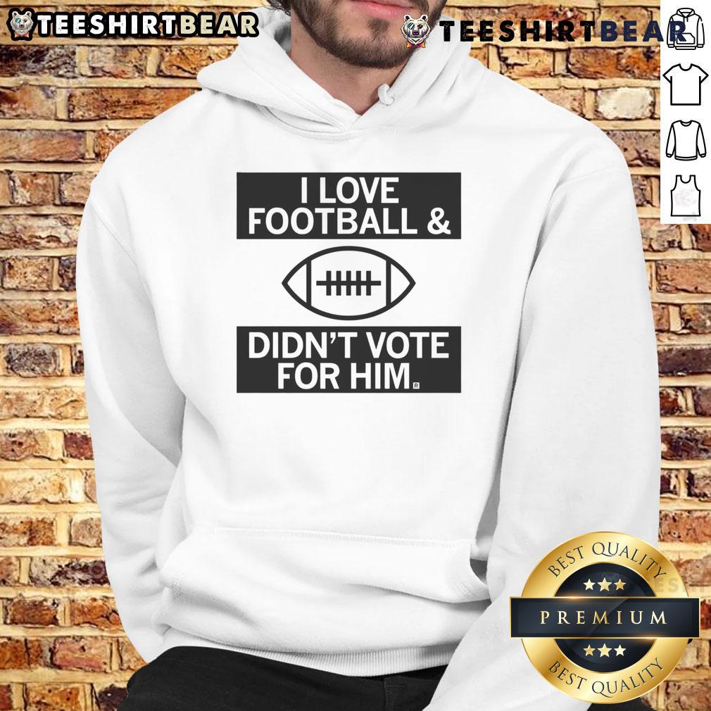 Top 'I Love Football And Didn't Vote For Him' hoodie featuring bold text design, perfect for football fans.