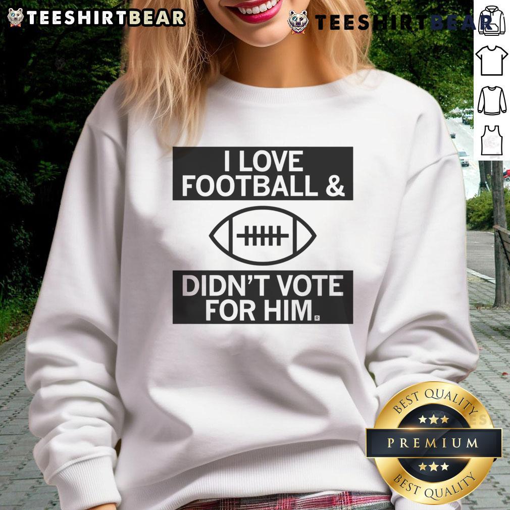 Cozy 'I Love Football And Didn't Vote For Him' sweatshirt in navy blue, perfect for football fans and casual wear.