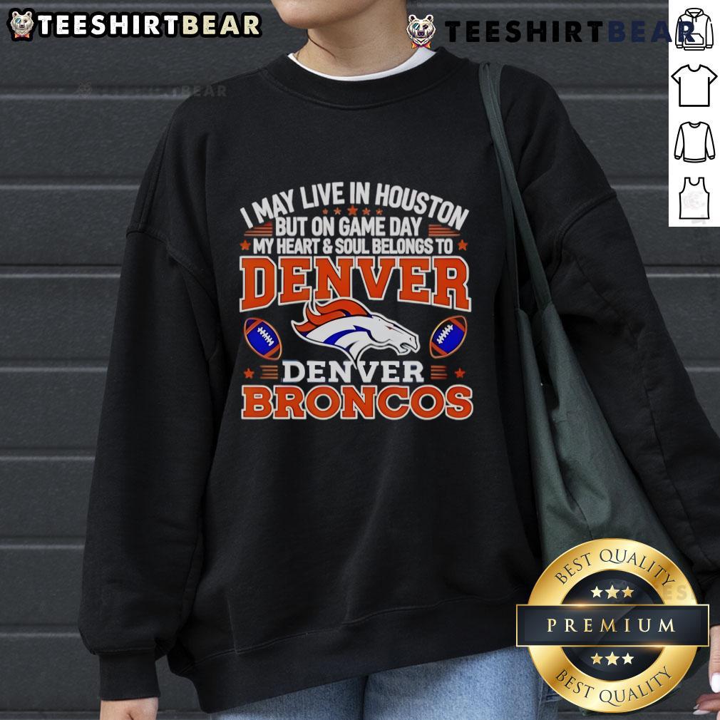 Alt Text: Cozy sweatshirt featuring I May Live in Houston, But My Heart Belongs to Denver Broncos design, perfect for game day.