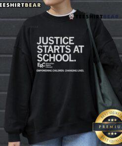 Empowering children sweatshirt promoting education rights, highlighting justice starts at school for better futures.