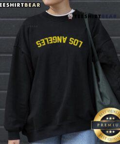 Trendy top Los Angeles upside-down sweatshirt featuring a unique design, perfect for casual streetwear fashion.
