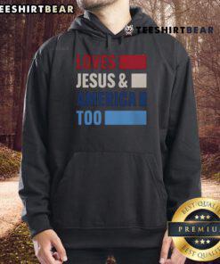 Bold hoodie featuring the phrase 'Top Loves Jesus and America Too' in vibrant colors, perfect for patriotic apparel.