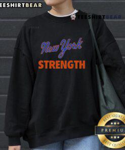 Top New York Mets strength sweatshirt featuring team colors and logo, perfect for fans and workouts.