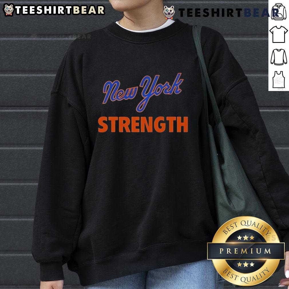 Top New York Mets strength sweatshirt featuring team colors and logo, perfect for fans and workouts.