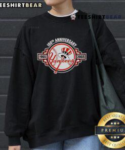 Top New York Yankees 1903-2003 100th Anniversary sweatshirt featuring classic logo and vintage design elements.