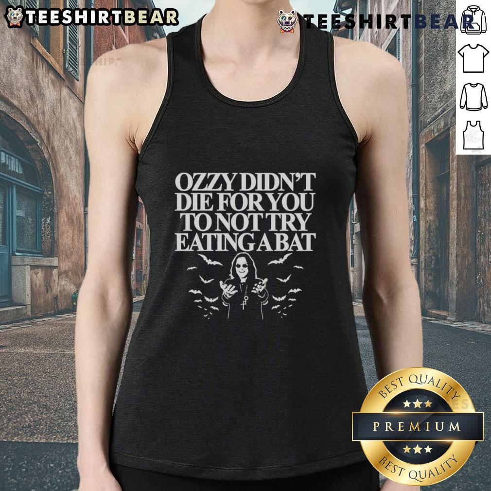 Person wearing 'Top Ozzy Didn't Die For You To Not Try Eating A Bat' tank top, showcasing rock music humor and style.