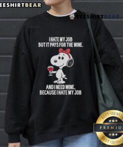 Alt Text: Snoopy 'I Hate My Job But It Pays For The Wine' sweatshirt, perfect for casual wear and wine lovers.