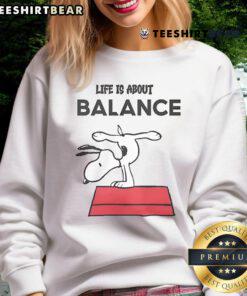 Alt Text: Cozy 'Top Snoopy Life Is About Balance Sweatshirt' featuring Snoopy graphic, perfect for casual wear and comfort.