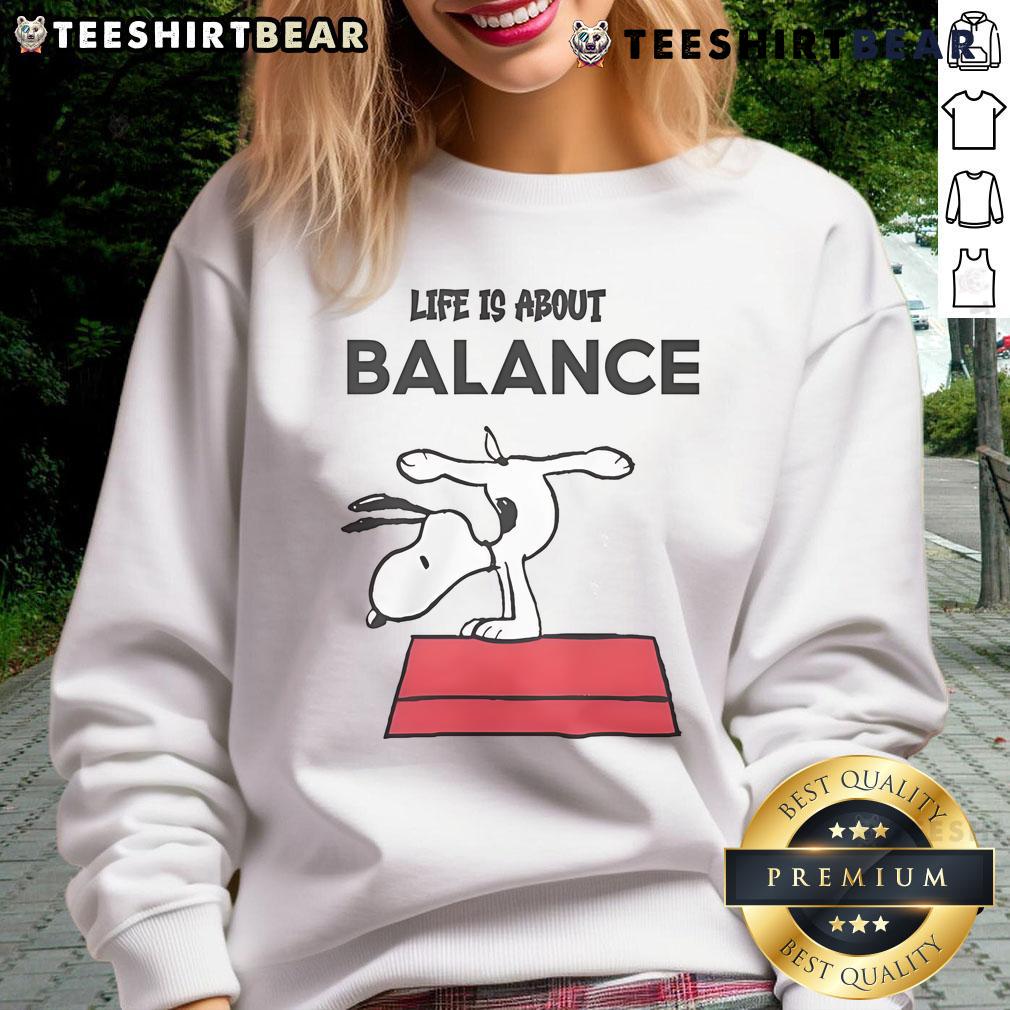 Alt Text: Cozy 'Top Snoopy Life Is About Balance Sweatshirt' featuring Snoopy graphic, perfect for casual wear and comfort.