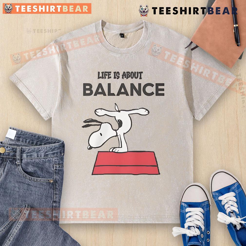 Top Snoopy Life Is About Balance Washed T-Shirt featuring a playful Snoopy graphic and relaxed fit for casual style.