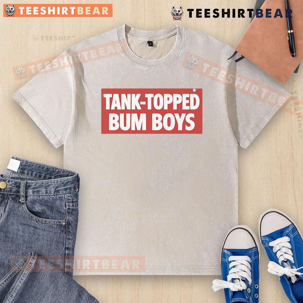 Group of young men in tank tops showcasing 'Top Tank Topped Bum Boys' washed t-shirt in a trendy outdoor setting.