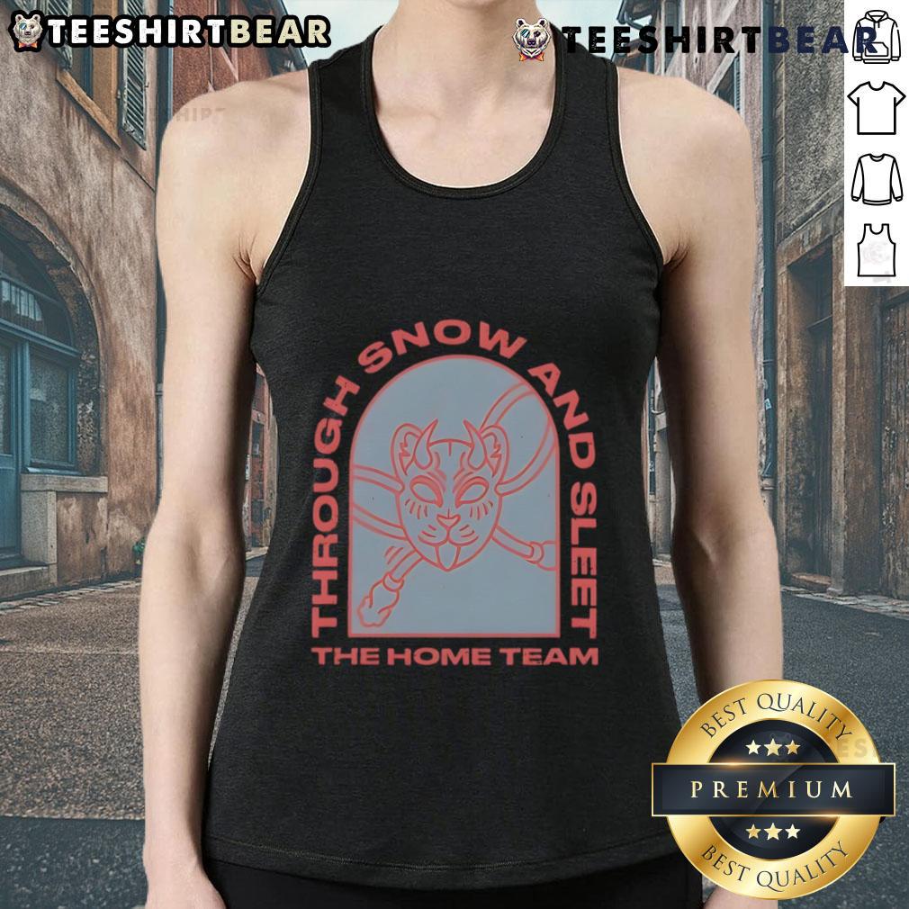 Alt Text: Woman wearing 'Top The Home Team Through Snow and Sleet' tank top outdoors in winter, showcasing team spirit.