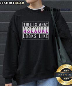 Alt Text: Asexual pride sweatshirt featuring bold text, Top This Is What Asexual Looks Like, perfect for asexuality awareness.