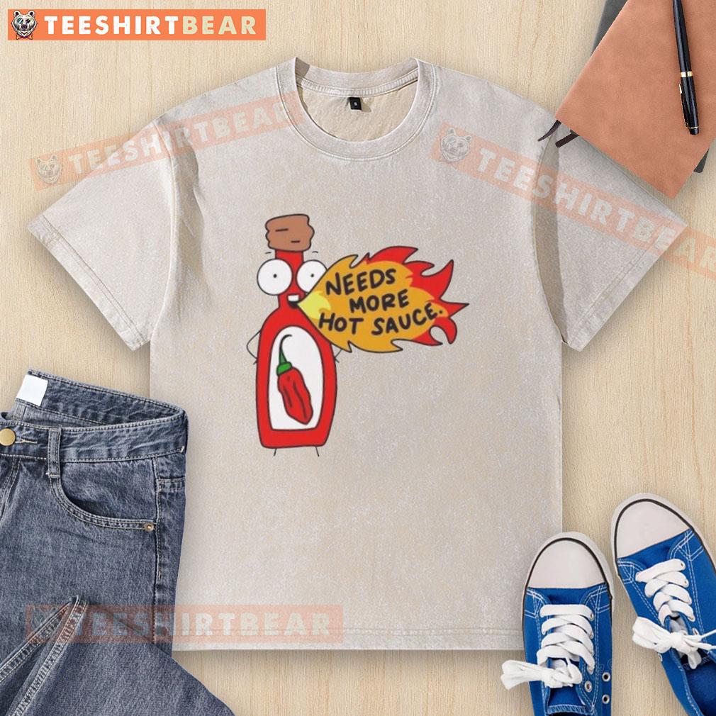 Funny cartoon on a washed t-shirt featuring spicy food and the phrase 'Awesome Needs More Hot Sauce' for chili lovers.