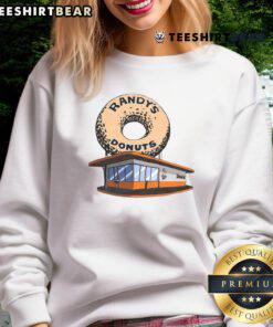 Awesome Randy's Donut Shop sweatshirt featuring a colorful donut graphic and cozy design, perfect for donut lovers.
