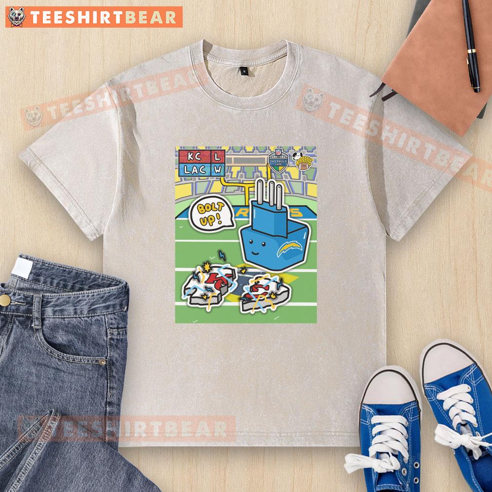 Los Angeles Chargers washed t-shirt celebrating their victory over Kansas City Chiefs in Brazil, showcasing team spirit.