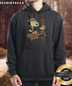 Cute Snoopy and Woodstock sushi design on a Tomodachi Club hoodie, perfect for fans of playful anime fashion.